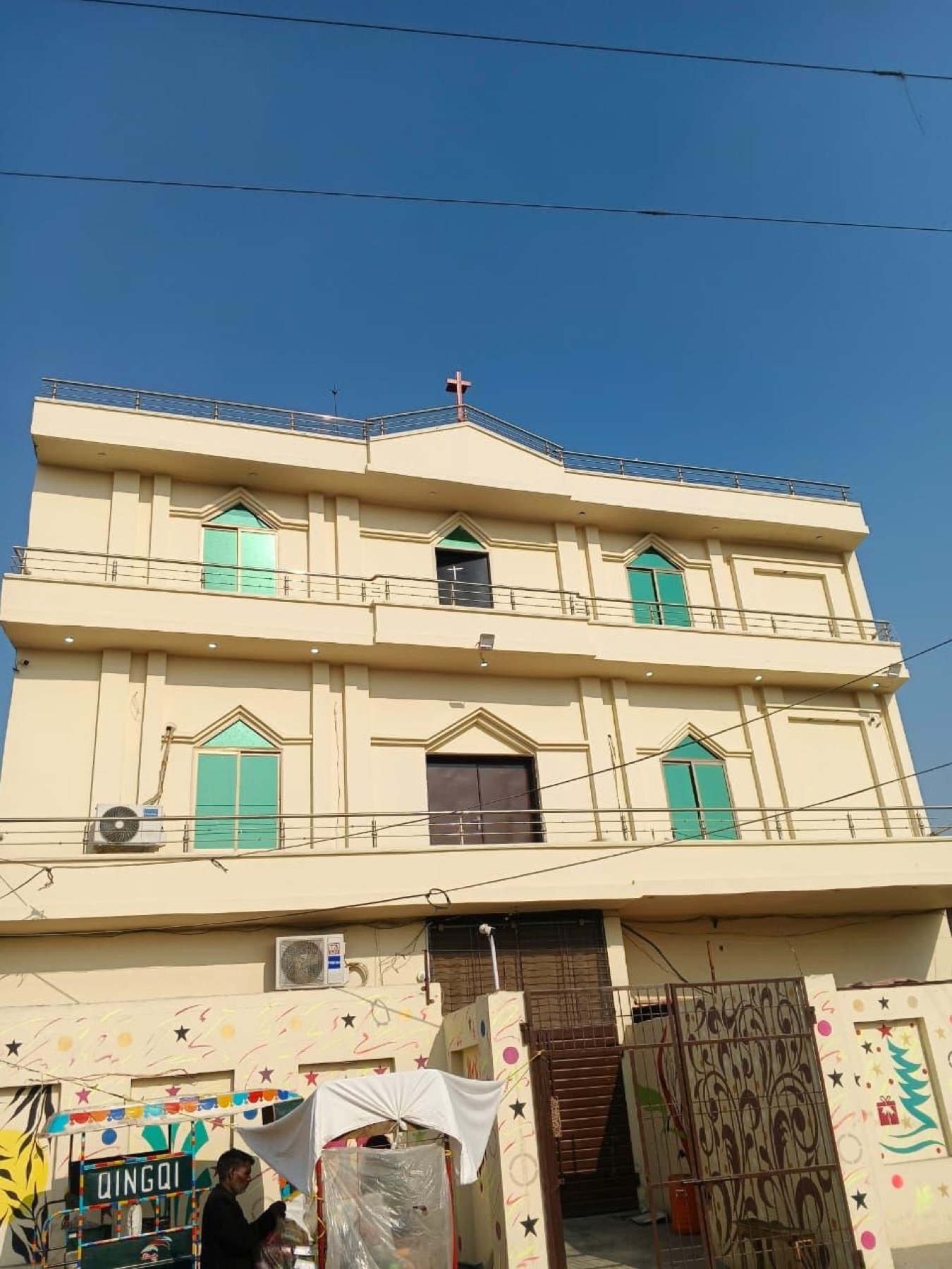 The Exodus51 church and school building with a cross raised on the roof
