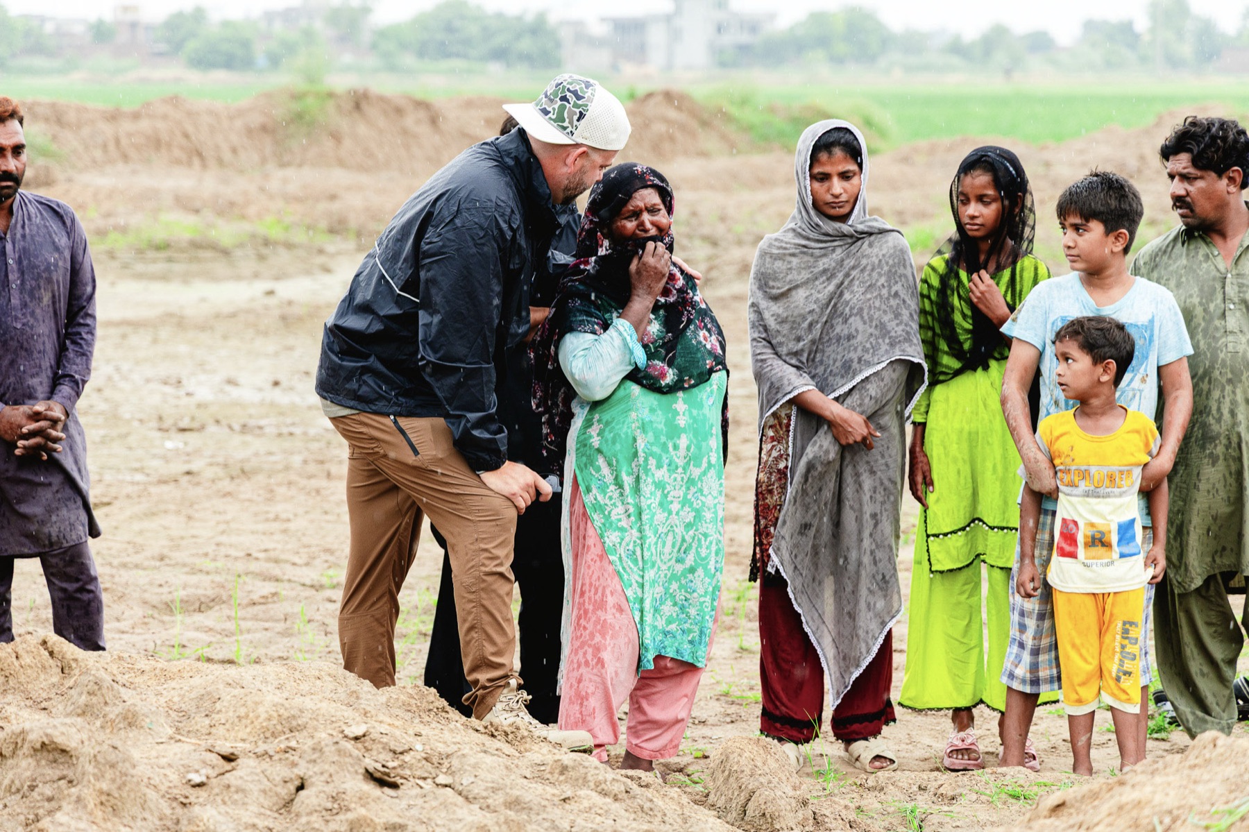 An Exodus51 team member comforts a weeping mother moments after her family is set free