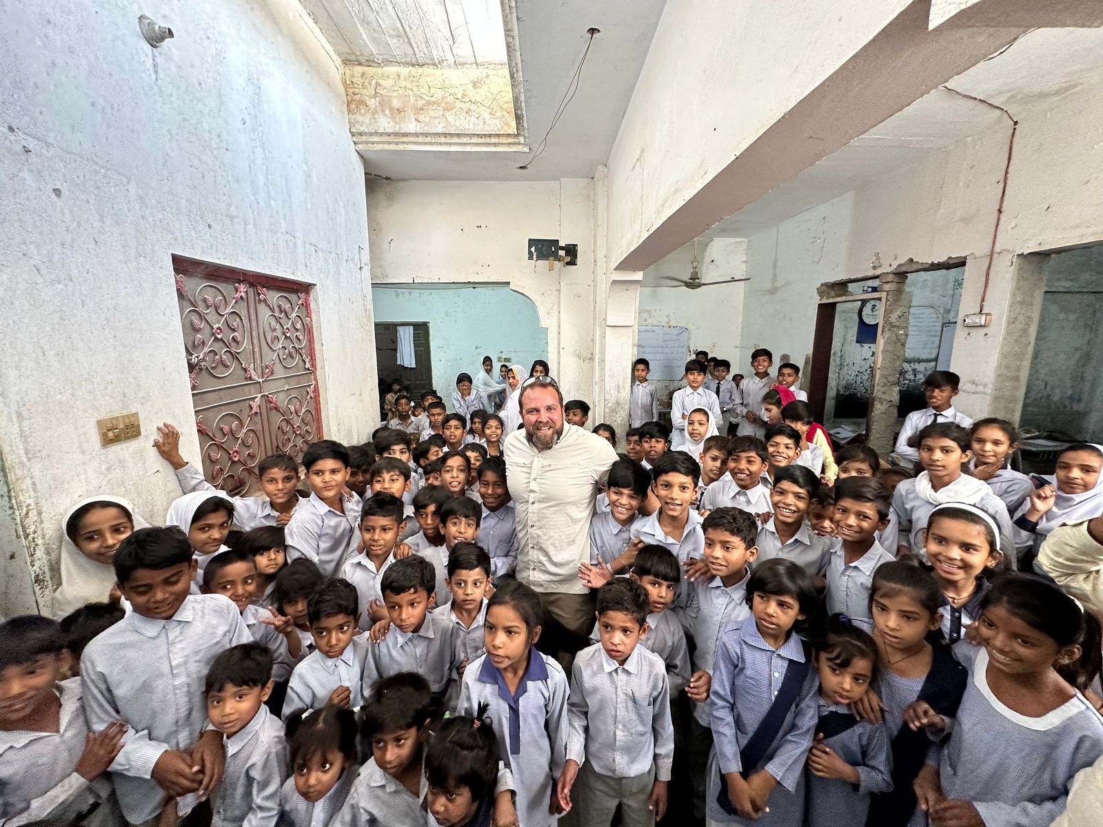 Hundreds of smiling students at the Exodus51 school